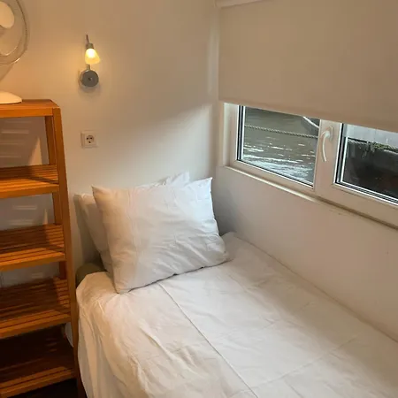 Tiny Houseboat On The Amstel River